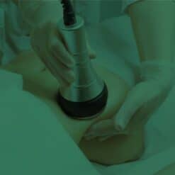 Ultrasound fat reduction treatment being performed on a patient for body slimming and contouring purpose.