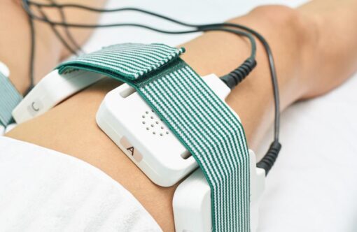 Wireless body scanner device attached to a person's abdomen for health monitoring, emphasizing advanced wellness technology for weight management and fitness.