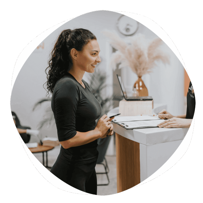 SLIMM, weight management consultation, healthy lifestyle coaching, personalized wellness plan, modern health and fitness expert at a wellness center.